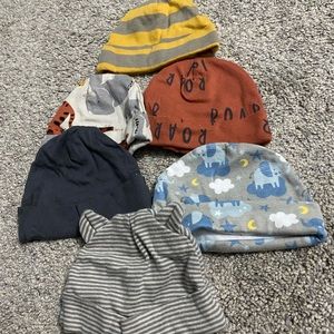 Newborn beanies, never worn, selling as bundle, all different patterns
